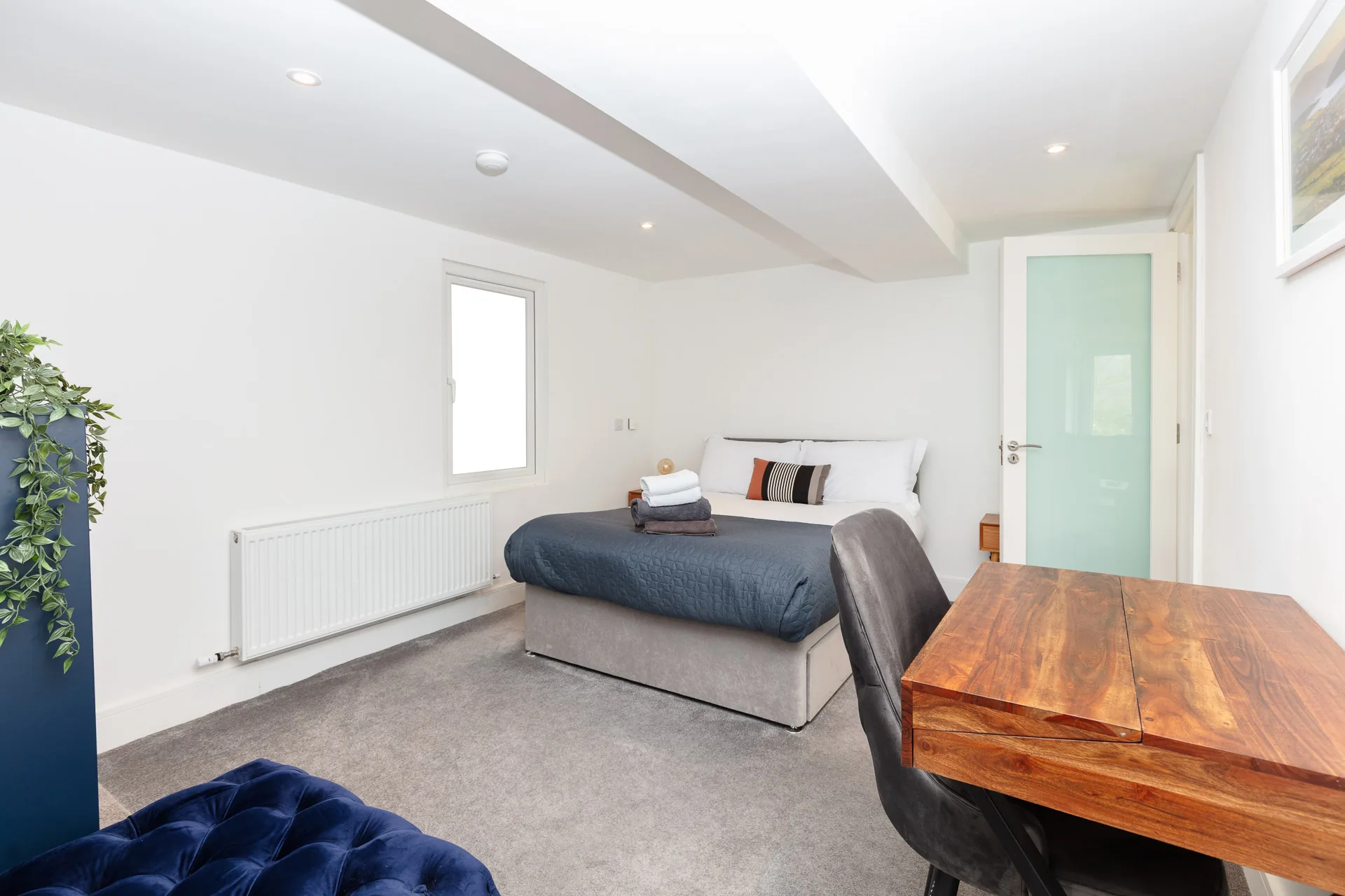 Double bedroom with desk at Milltown Cottage